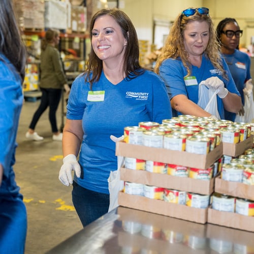 Volunteer smiling.