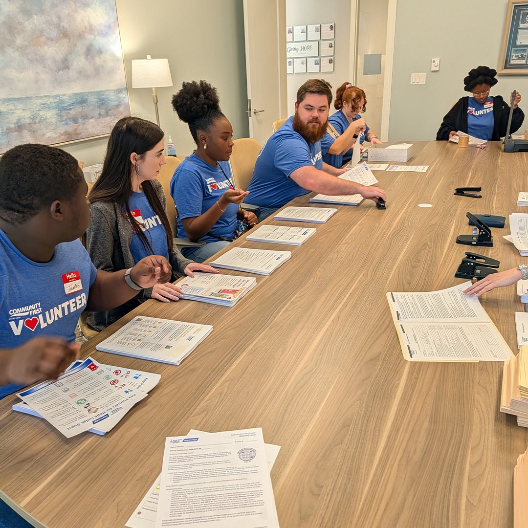 Volunteers at table.