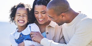 Family laughing happily together Family laughing happily together