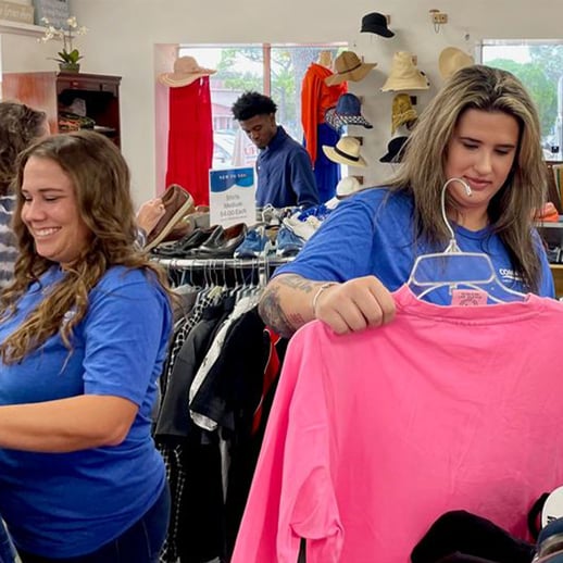 Volunteers at Barnabas sorting clothes.