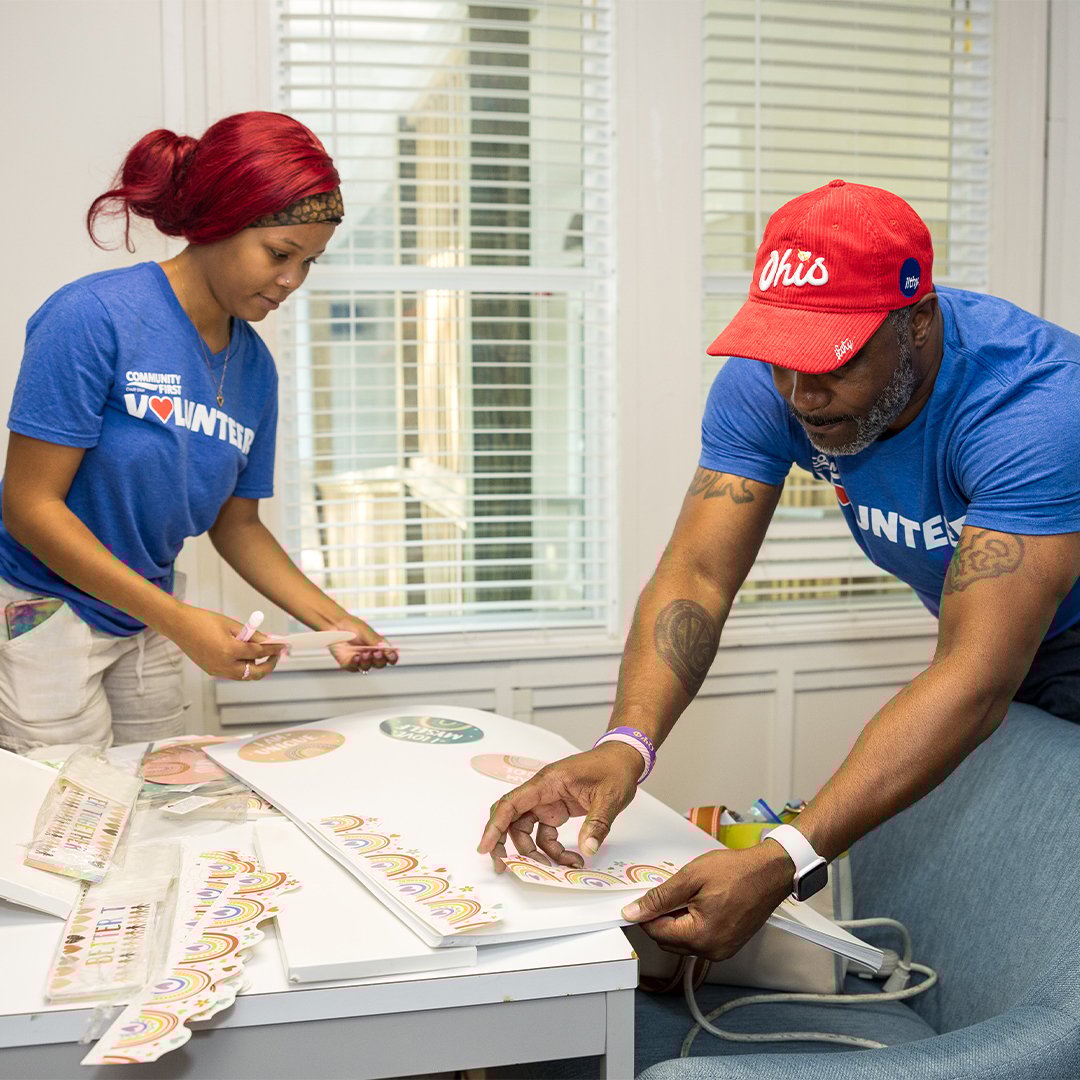 Two volunteers working. Two volunteers working.