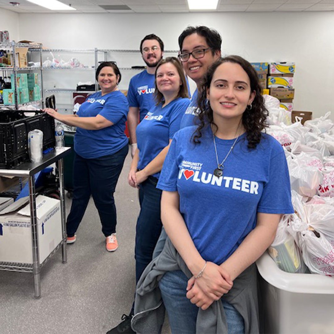 Volunteers Smiling.