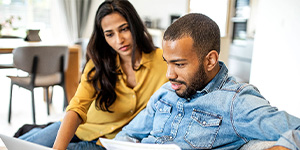 A couple reviewing their finances.